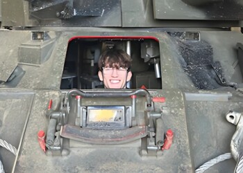 Leo helps set up tanks trip